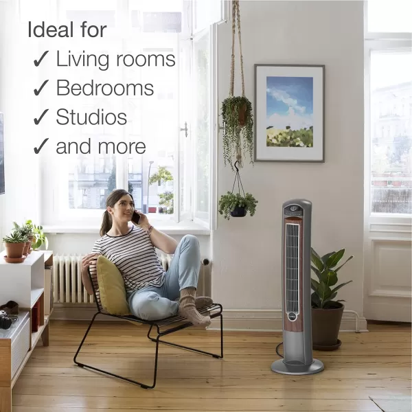 Lasko Oscillating Tower Fan, Remote Control, Ionizer, 3 Speeds, Timer, for Bedroom, Office, Kitchen 42", Black, T42950