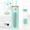 imageTronco 20oz Glass Tumbler with Bamboo Lid and Straw Glass Cup For BobaIced CoffeeSmoothie Spill Proof Glass Water Bottle With Silicone Protective Sleeve Dishwasher SafeBPA FreePureBlue