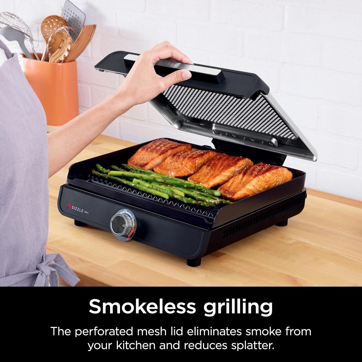 imageNinja GR101 Sizzle Smokeless Indoor Grill ampamp Griddle 14 Interchangeable Nonstick Plates DishwasherSafe Removable Mesh Lid 500F Max Heat Even EdgetoEdge Cooking GreySilver RenewedSizzle Indoor Grill