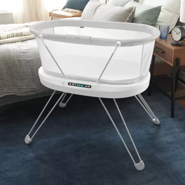 FisherPrice Baby Bedside Sleeper Luminate Bassinet with Sound Detection plus Customizable Lights Music and Sounds for Newborns 0 Months