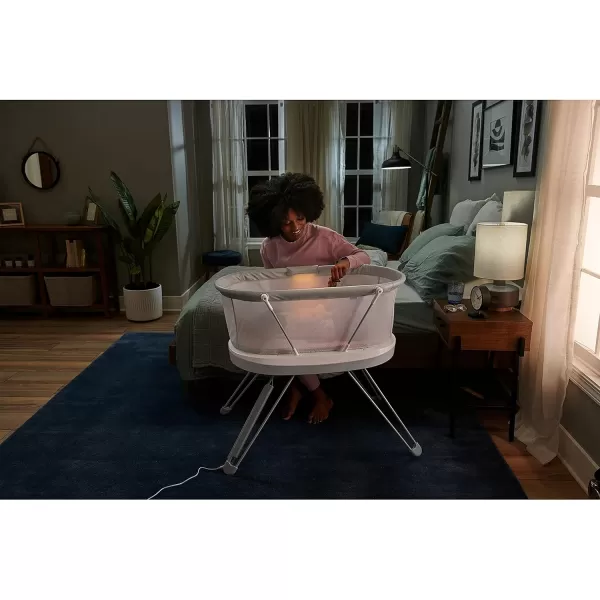 FisherPrice Baby Bedside Sleeper Luminate Bassinet with Sound Detection plus Customizable Lights Music and Sounds for Newborns 0 Months