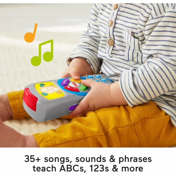 FisherPrice Baby Learning Toy Laugh ampamp Learn Puppys Remote Pretend TV Control with Music ampamp Lights for Developmental Play Infants Ages 6 MonthsPuppys Remote  Classic Version