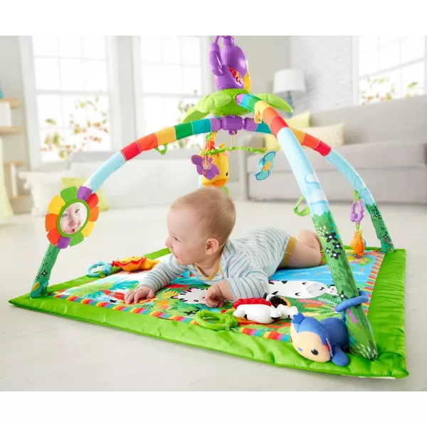 FisherPrice Baby Playmat Rainforest Music ampamp Lights Deluxe Gym with 10 Activities ampamp Toys for Developmental Play Newborns Ages 0 MonthsStandard Packaging