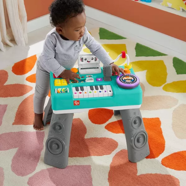 FisherPrice Baby ampamp Toddler Toy Laugh ampamp Learn Mix ampamp Learn DJ Table Musical Activity Center with Lights ampamp Sounds for Infants Ages 6 MonthsLanguages Latin  English