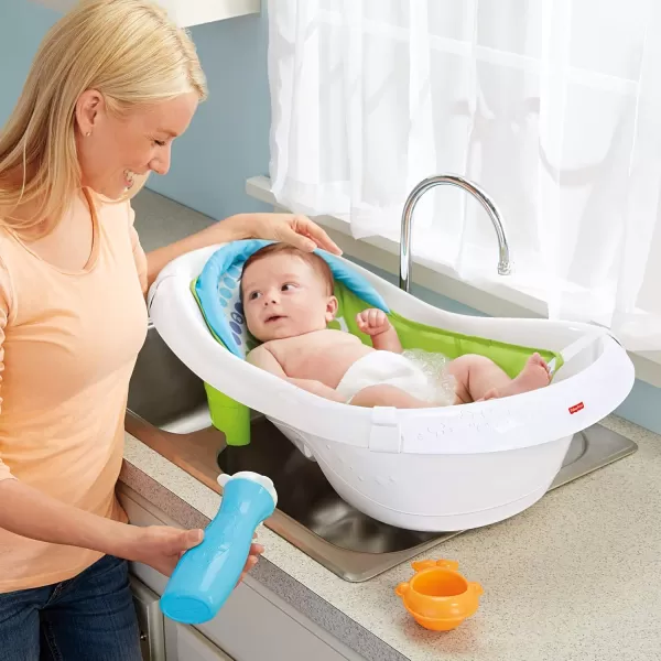 FisherPrice Baby to Toddler Bath 4in1 Sling n Seat Tub with Removable Infant Support and 2 Toys Climbing LeavesGreen