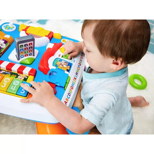 FisherPrice Baby to Toddler Toy Laugh ampamp Learn Around the Town Learning Activity Table with Music ampamp Lights for Infants Ages 6 Months Amazon Exclusive
