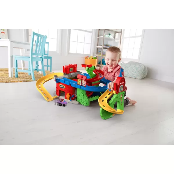 FisherPrice Little People Toddler Toy Sit n Stand Skyway Race Track Playset 34 Inches Tall 2 Cars for Pretend Play Kids Ages 18 MonthsStandard Packaging