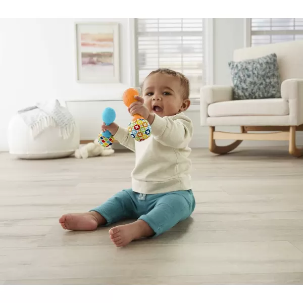 FisherPrice Newborn Toys Rattle n Rock Maracas 2 Soft Musical Instruments for Developmental Play Babies Ages 3 Months Green ampamp YellowBlueOrange