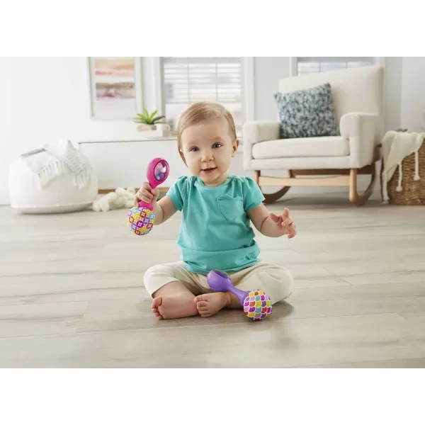 FisherPrice Newborn Toys Rattle n Rock Maracas 2 Soft Musical Instruments for Developmental Play Babies Ages 3 Months Green ampamp YellowRattle n Roll Maracas