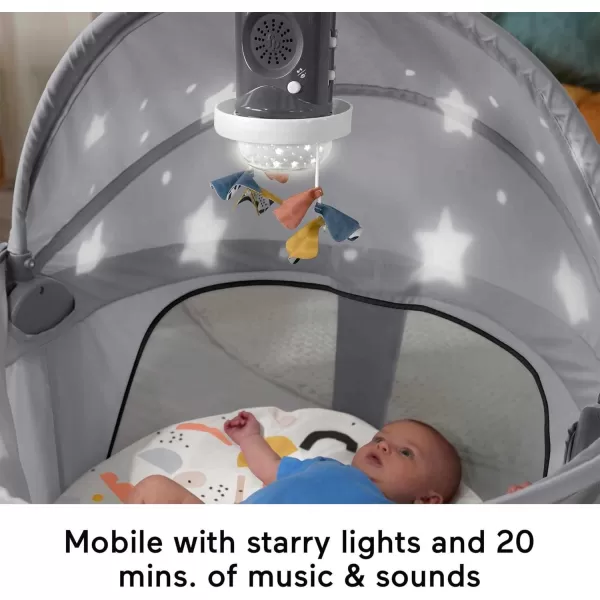 FisherPrice Portable Baby Bassinet Deluxe OnTheGo Projection Dome Travel Play Space for Newborns with Lights Music ampamp Canopy Paper ShapesGray