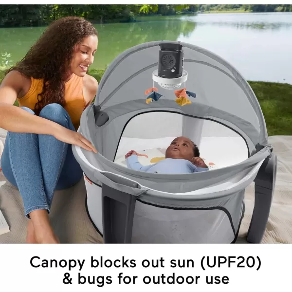 FisherPrice Portable Baby Bassinet Deluxe OnTheGo Projection Dome Travel Play Space for Newborns with Lights Music ampamp Canopy Paper ShapesGray