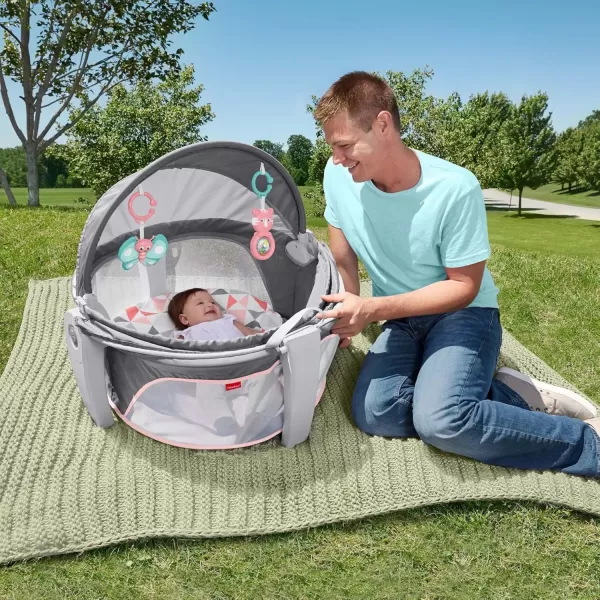 FisherPrice Portable Bassinet OnTheGo Baby Dome Travel Play Space with Developmental Newborn Toys ampamp Canopy Rosy Windmill