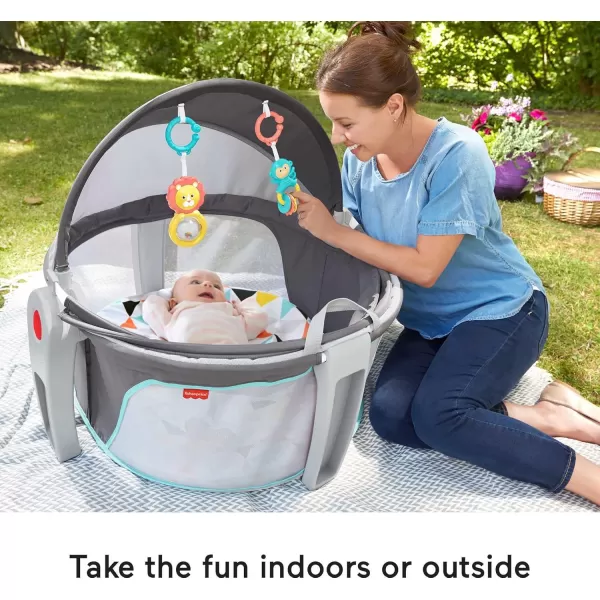 FisherPrice Portable Bassinet OnTheGo Baby Dome Travel Play Space with Developmental Newborn Toys ampamp Canopy Windmill