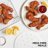 imageChefman Disposable Air Fryer Liners HeatResistant Parchment Paper For Baskets 100 Pack 7 Round9 Round