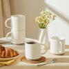 imageSweese Stackable Coffee Mugs  10 Oz Porcelain Cups with Sculpture design for Specialty Coffee Drinks Cappuccino Cafe Mocha Latte and tea Set of 4 White