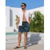image:imageEkouaer Mens 7 Swim Trunks Swimwear Zip Pockets Beach Board Shorts Bathing Suits with Mesh LiningZ Black Blue Leaf