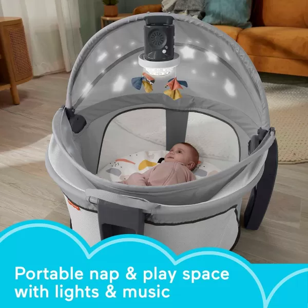 FisherPrice Baby Portable Baby Bassinet And Play Space Deluxe OnTheGo Projection Dome With Lights Music And CanopyPaper ShapesGray