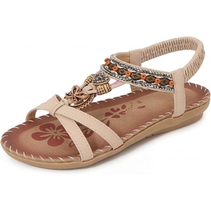 image:imageAllegra K Women Bohemian Rhinestone Knot Flat Ankle Elastic Sandals  TPR outsole Open toe butterfly decor Casual walking lounging Comfortable flat ankle elastic designKhaki