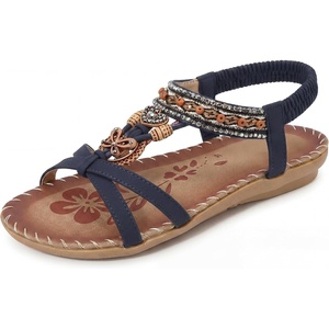 image:imageAllegra K Women Bohemian Rhinestone Knot Flat Ankle Elastic Sandals  TPR outsole Open toe butterfly decor Casual walking lounging Comfortable flat ankle elastic designBlue