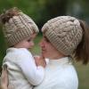 imageFURTALK Ponytail Beanies for Women Messy Bun Winter Hat with Tail Hole Warm Lined Knit Skull Beanie Outdoor Runner CapGrey