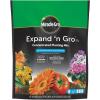 imageMiracleGro Expand n Gro Concentrated Planting Mix Just Add Water for up to 3X Expansion For Container and InGround Use 33 cu ft Expands up to 1 cu ft33 cu FT