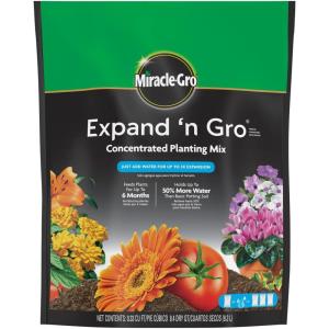 imageMiracleGro Expand n Gro Concentrated Planting Mix Just Add Water for up to 3X Expansion For Container and InGround Use 33 cu ft Expands up to 1 cu ft33 cu FT