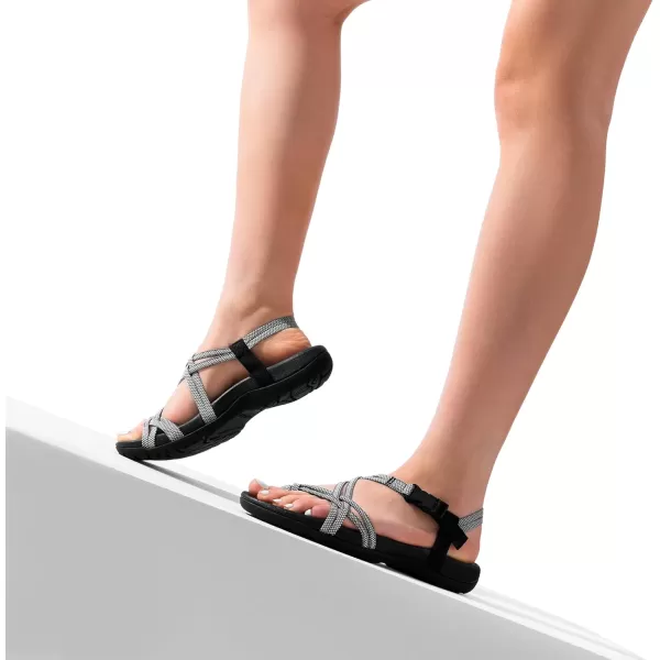 imageDREAM PAIRS Womens Comfort Walking Sport Athletic Sandals With Arch Support Elastic Strap Casual Hiking Outdoor Beach Summer ShoesBlackWhite