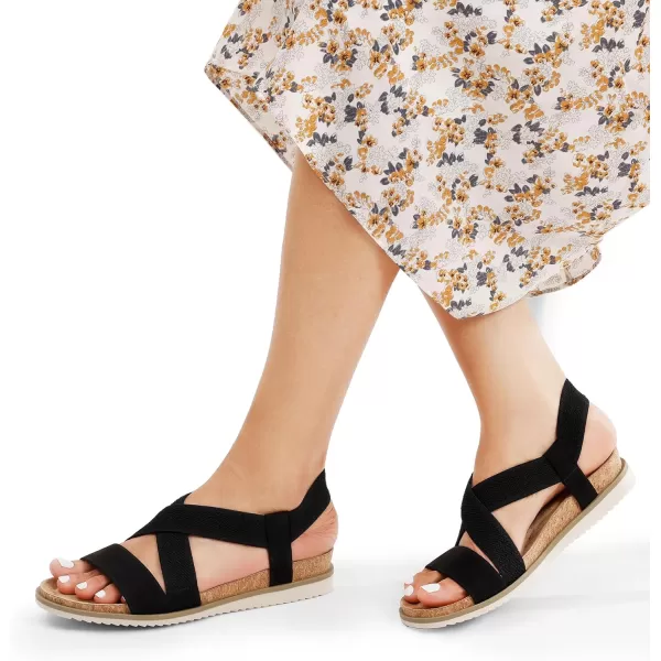 imageDREAM PAIRS Womens Comfortable Low Wedge Sandals Open Toe Slip On Strappy Flat Sandals with Elastic Ankle StrapBlacksuede