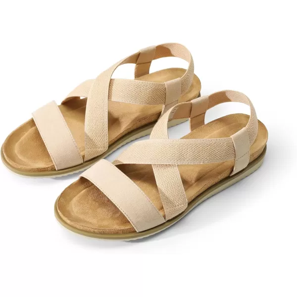 imageDREAM PAIRS Womens Comfortable Low Wedge Sandals Open Toe Slip On Strappy Flat Sandals with Elastic Ankle StrapNudesuede