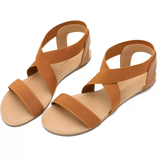 imageDREAM PAIRS Womens Elastic Ankle Strap Flat Sandals Summer Dressy Shoes Cute Strappy Gladiator SandalsTan